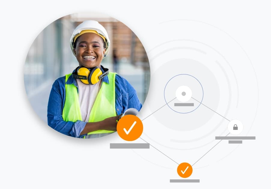 woman wearing hard hat and bright vest