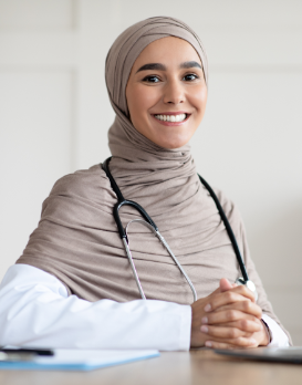A young woman doctor wearing a headscarf